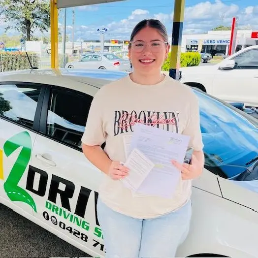 A Girl Completing Learn To Drive Driving Lesson — L2Drive Driving School in Warwick, QLD