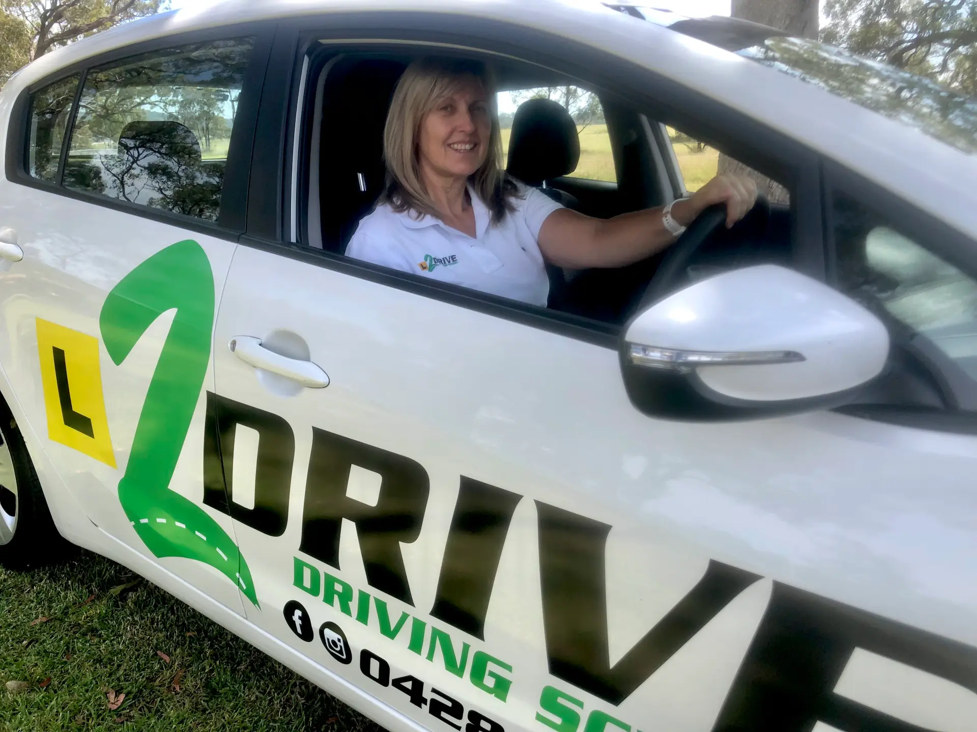 Rebecca, L2Drive Driving School Instructor, Sitting In The Driver's Seat